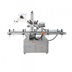 Automatic flat top surface labeling machine